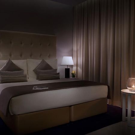 Damac Maison The Vogue Dubai Eksteriør bilde A bedroom at the hotel