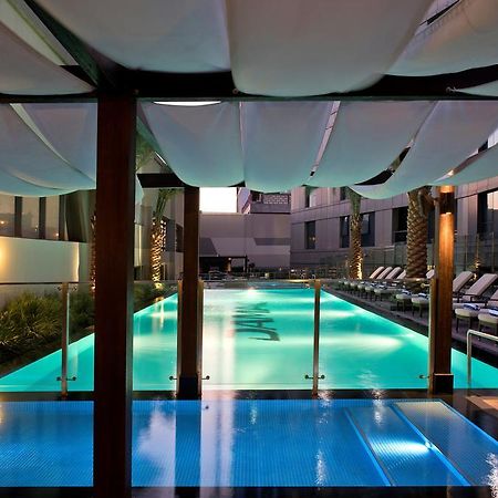 Damac Maison The Vogue Dubai Eksteriør bilde The pool at the hotel