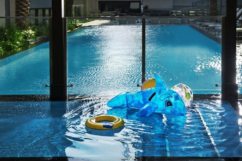 Damac Maison The Vogue Dubai Eksteriør bilde The swimming pool at the Ritz-Carlton, Singapore