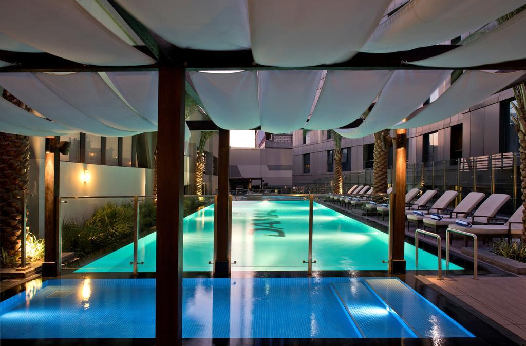 Damac Maison The Vogue Dubai Eksteriør bilde The pool at the hotel