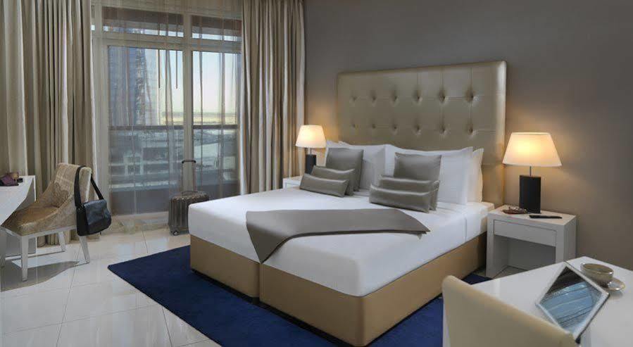 Damac Maison The Vogue Dubai Eksteriør bilde A bedroom at the hotel