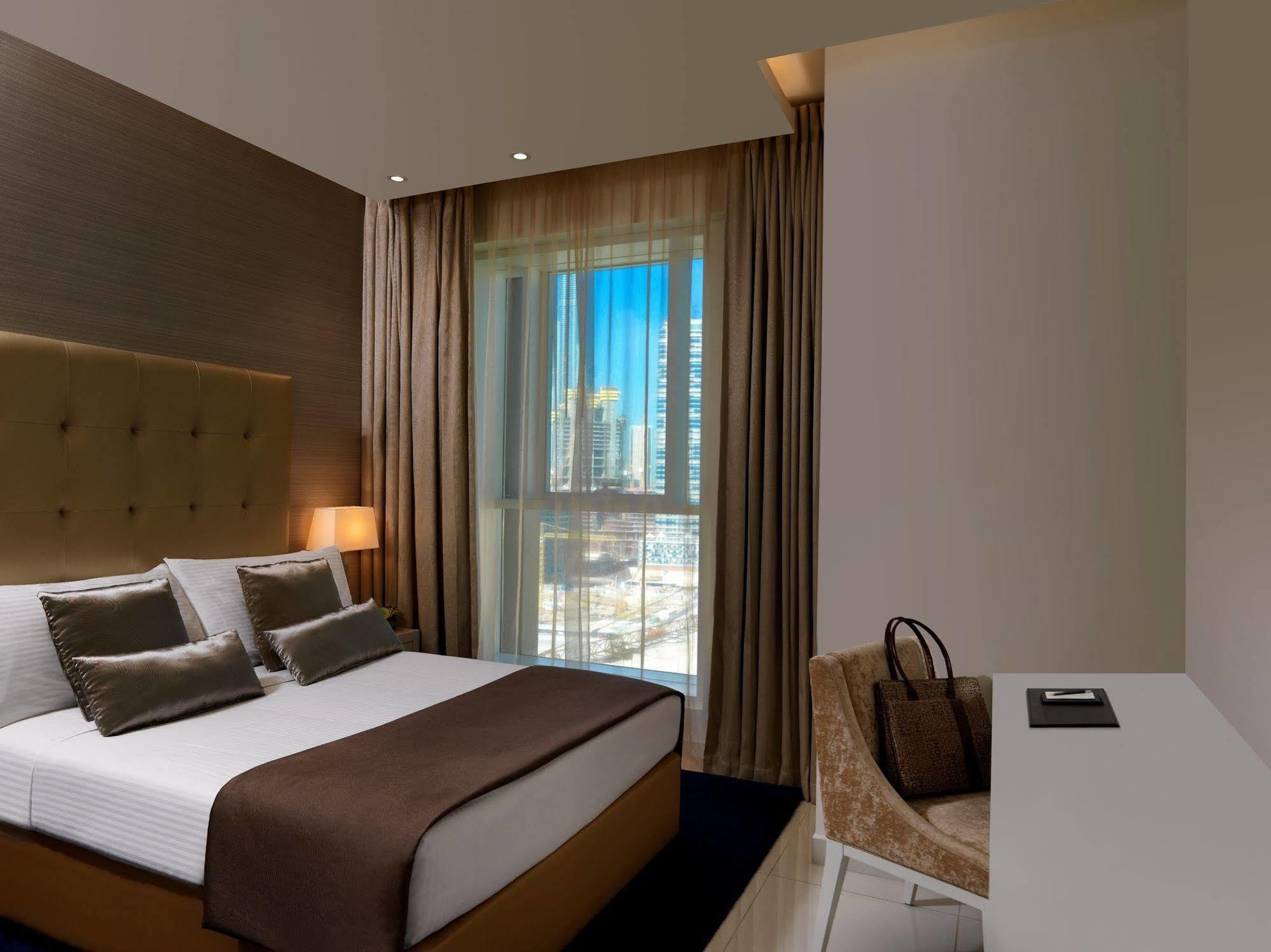 Damac Maison The Vogue Dubai Eksteriør bilde A bedroom at the hotel